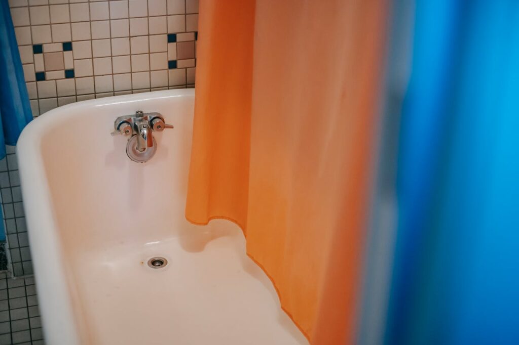 Shower Curtain with Hooks Built-In Is a Game-Changer for Clean Bathrooms